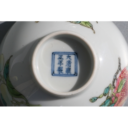 515 - A Chinese footed bowl decorated with fruit to include peaches and pomegranates, six character blue m... 