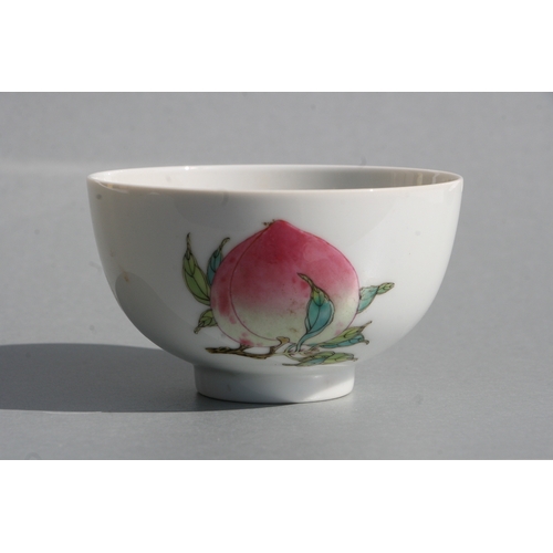 515 - A Chinese footed bowl decorated with fruit to include peaches and pomegranates, six character blue m... 