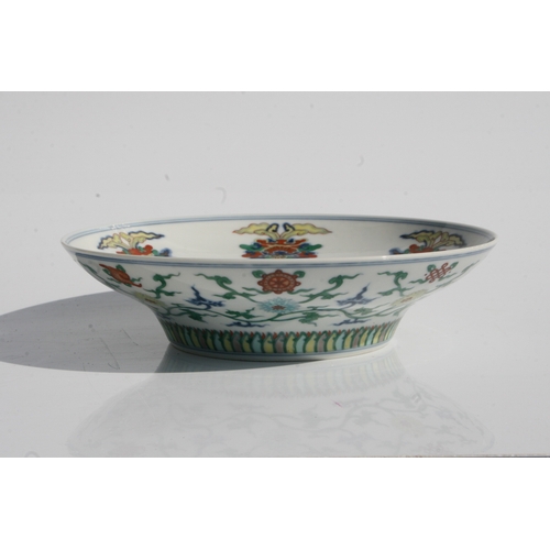 528 - A Chinese Ducai style bowl of shallow flared form decorated with scrolling flowers and foliage, blue... 