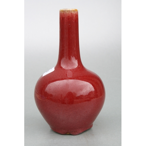 524 - A Chinese flambé glaze bottle vase, 18cms high.