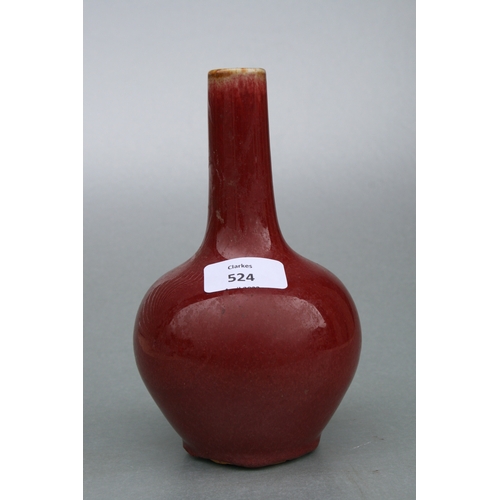 524 - A Chinese flambé glaze bottle vase, 18cms high.