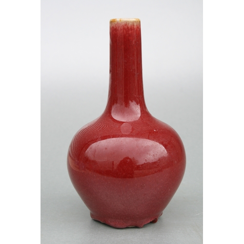 524 - A Chinese flambé glaze bottle vase, 18cms high.