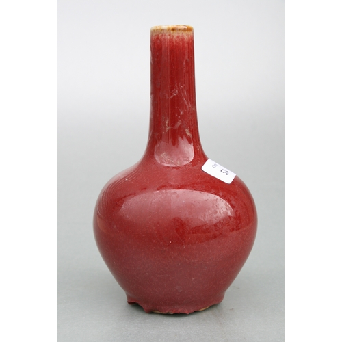 524 - A Chinese flambé glaze bottle vase, 18cms high.