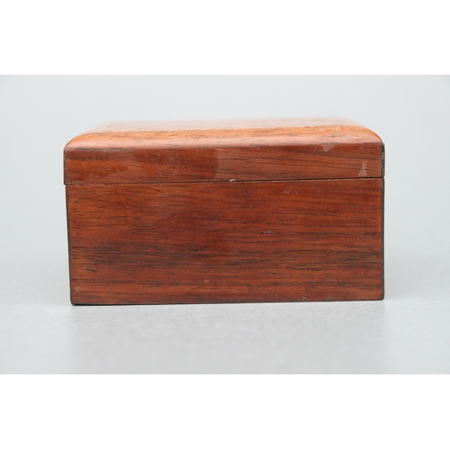 556 - A Chinese hardwood rectangular box and cover (possibly huanghuali), the cover with inlaid decoration... 