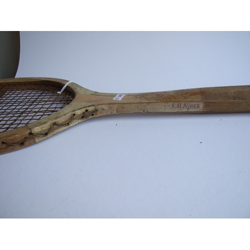 87 - A vintage Model D tennis racquet, 69cms long.