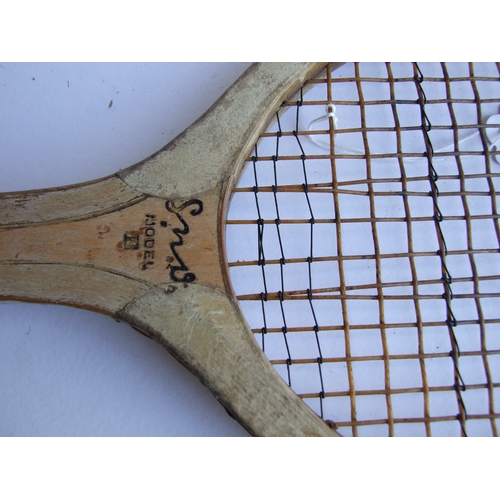 87 - A vintage Model D tennis racquet, 69cms long.