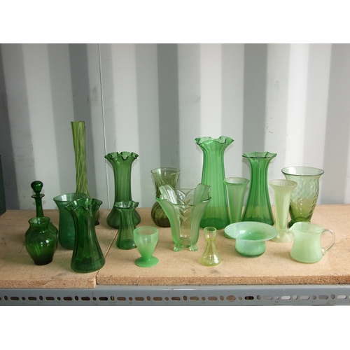 244 - A quantity of green pressed and moulded glass to include hyacinth and tulip vases and a pair of Fren... 