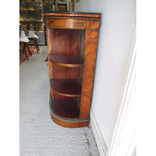 760 - A 19th century figured walnut Credenza, the pair of mirrored doors enclosing a shelved interior flan... 