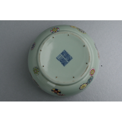 636 - Two Chinese Canton Export plates decorated with birds, flowers and insects; together with a similar ... 