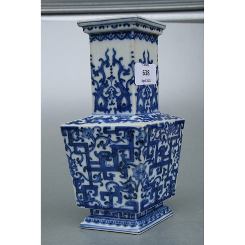 638 - A Chinese blue & white vase of lozenge form with blue seal mark to the underside, 21cms high.