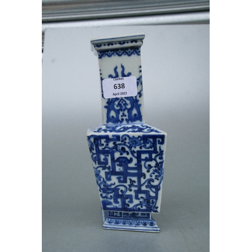 638 - A Chinese blue & white vase of lozenge form with blue seal mark to the underside, 21cms high.