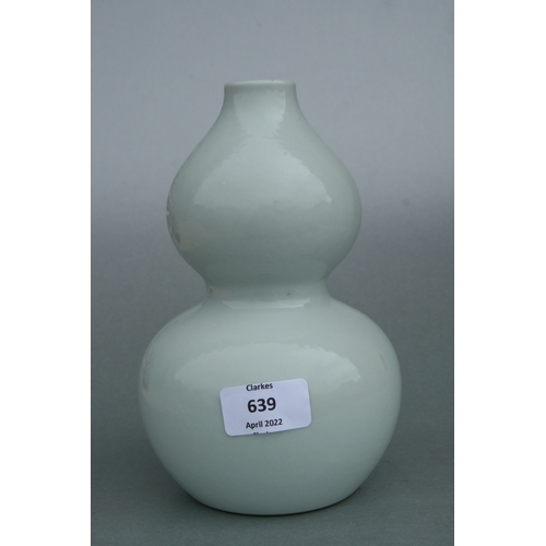 639 - A Chinese pale celadon glaze double gourd vase on stand, six character blue mark to the underside wi... 