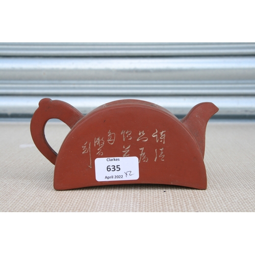 635 - A Chinese Yixing pottery teapot, 9ccms high; together with a similar stump form planter with impress... 