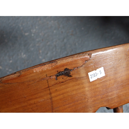 685 - Three elm and fruitwood kitchen chairs on turned legs joined by a stretcher (3).