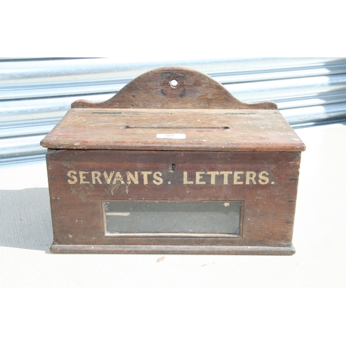 384 - A Victorian country house stained pine servants letters box, the front sign written and with sight w... 