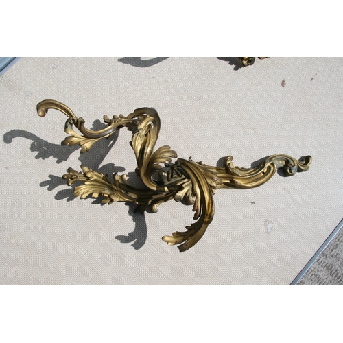 654 - A group of rococo style ormolu wall sconces (a/f).