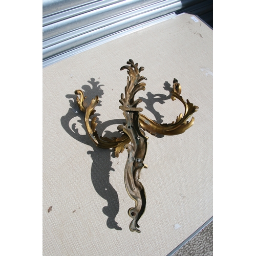 654 - A group of rococo style ormolu wall sconces (a/f).