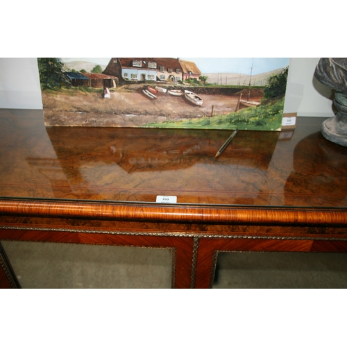 760 - A 19th century figured walnut Credenza, the pair of mirrored doors enclosing a shelved interior flan... 