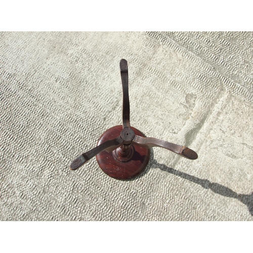 776 - An inlaid mahogany wine table on turned column and tripod base, 39cms wide; together with three simi... 