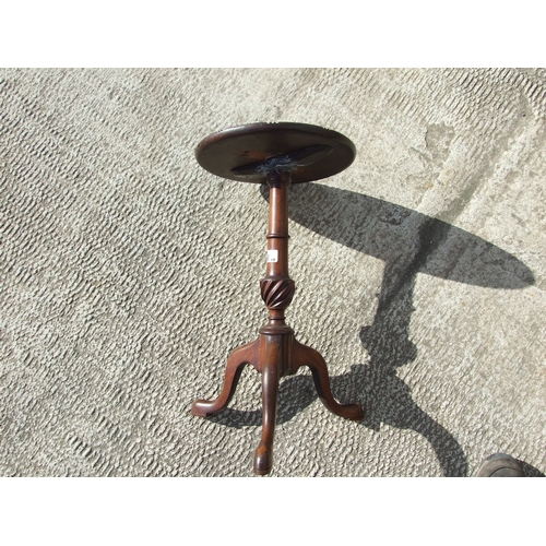 776 - An inlaid mahogany wine table on turned column and tripod base, 39cms wide; together with three simi... 