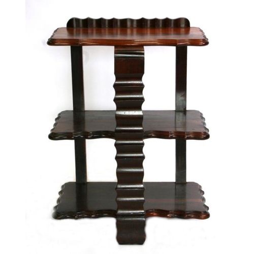 1236 - A continental walnut three-tier Whatnot with shaped rectangular tiers, 54cms wide.