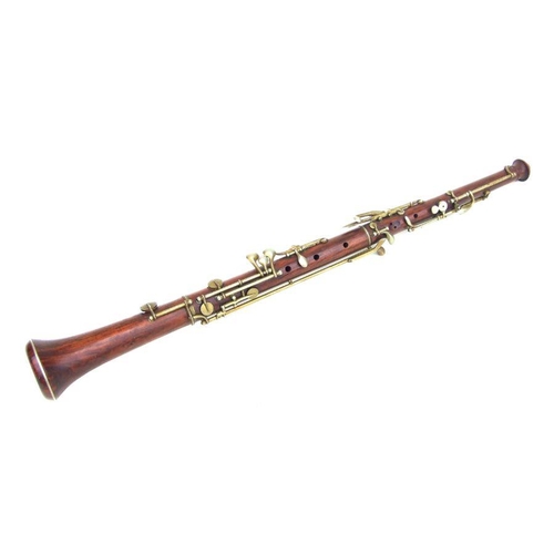 164 - A late 19th / early 20th century hardwood three-piece oboe, 56cms long.