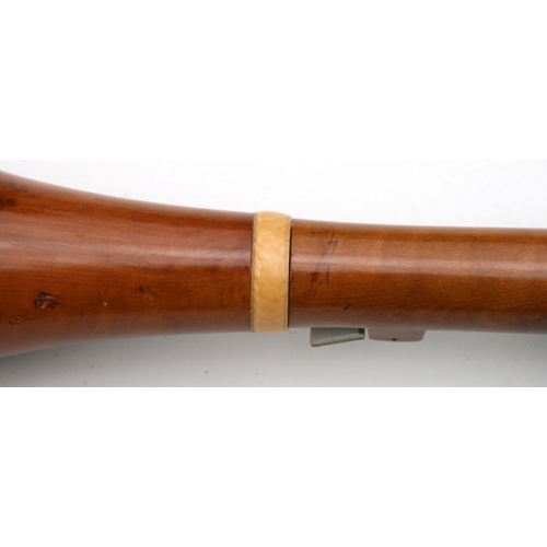 165 - A 19th century pearwood and ivory clarinet by Metzler & Co. London, 59cms long.  APHA registrati... 