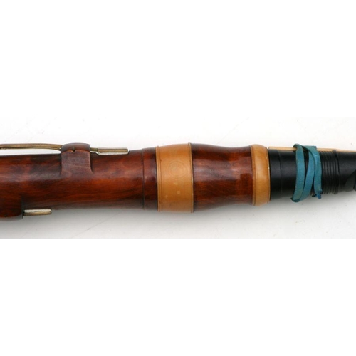 165 - A 19th century pearwood and ivory clarinet by Metzler & Co. London, 59cms long.  APHA registrati... 