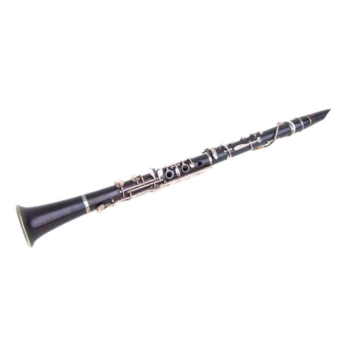 166 - A four-piece cocuswood clarinet, retailed by 'A Chappell, 52 New Bond Street, London', manufactured ... 