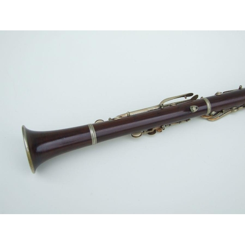 167 - A late 19th / early 20th century five-piece hardwood clarinet, the thumb support stamped 'JTL', 57cm... 