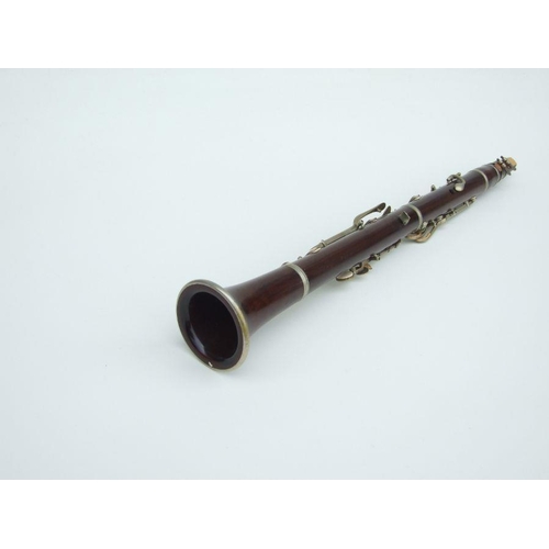 167 - A late 19th / early 20th century five-piece hardwood clarinet, the thumb support stamped 'JTL', 57cm... 