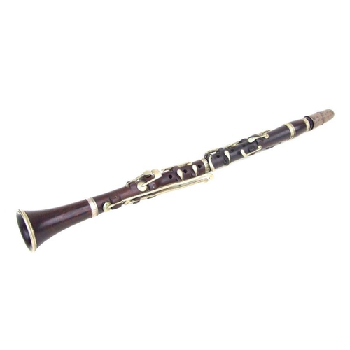 168 - A late 19th / early 20th century five-piece hardwood clarinet, 65cms long.