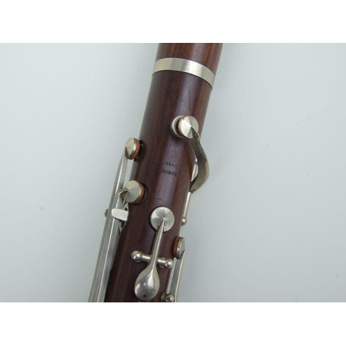 169 - A Ball Beavon & Co. five-piece rosewood clarinet, 65cms long.