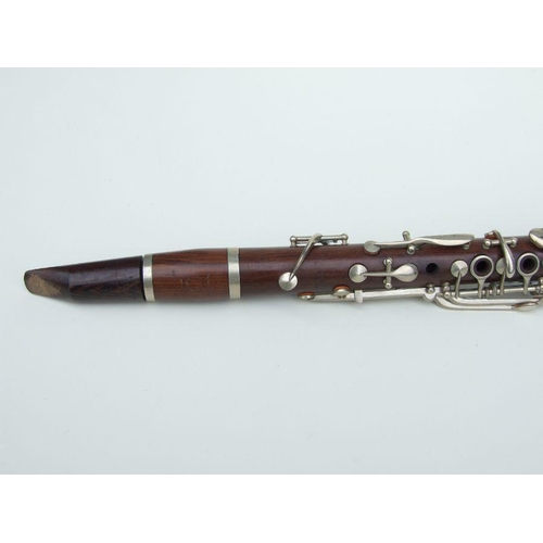 169 - A Ball Beavon & Co. five-piece rosewood clarinet, 65cms long.