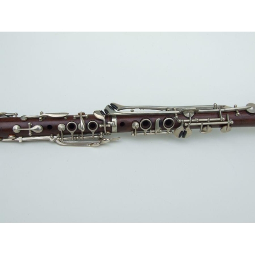 169 - A Ball Beavon & Co. five-piece rosewood clarinet, 65cms long.