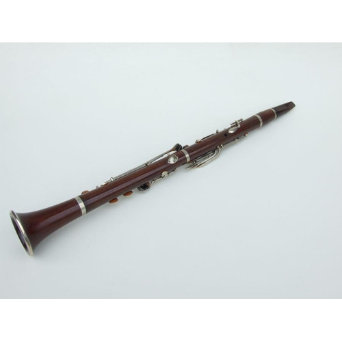 169 - A Ball Beavon & Co. five-piece rosewood clarinet, 65cms long.