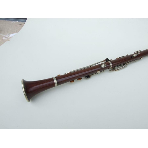 169 - A Ball Beavon & Co. five-piece rosewood clarinet, 65cms long.