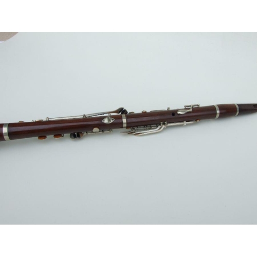 169 - A Ball Beavon & Co. five-piece rosewood clarinet, 65cms long.