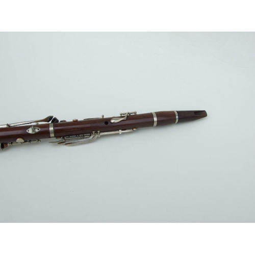 169 - A Ball Beavon & Co. five-piece rosewood clarinet, 65cms long.