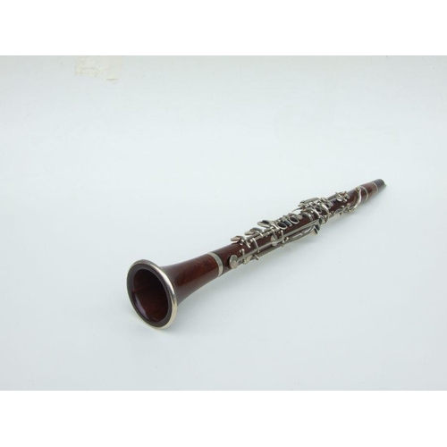 169 - A Ball Beavon & Co. five-piece rosewood clarinet, 65cms long.