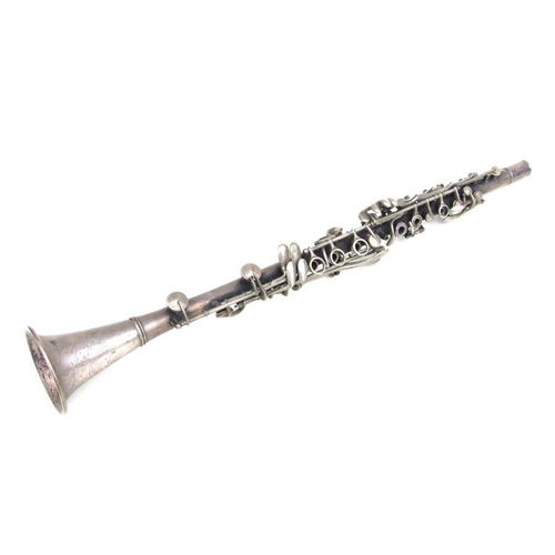 170 - An early 20th century Cleveland Musical Instrument Co. silver plated clarinet, 55cms long (missing m... 