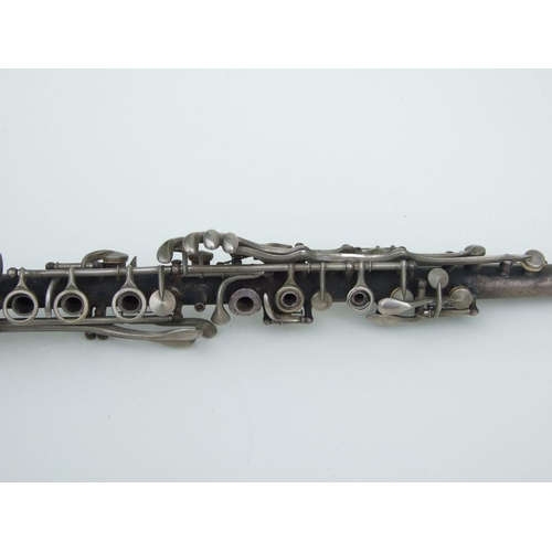 170 - An early 20th century Cleveland Musical Instrument Co. silver plated clarinet, 55cms long (missing m... 