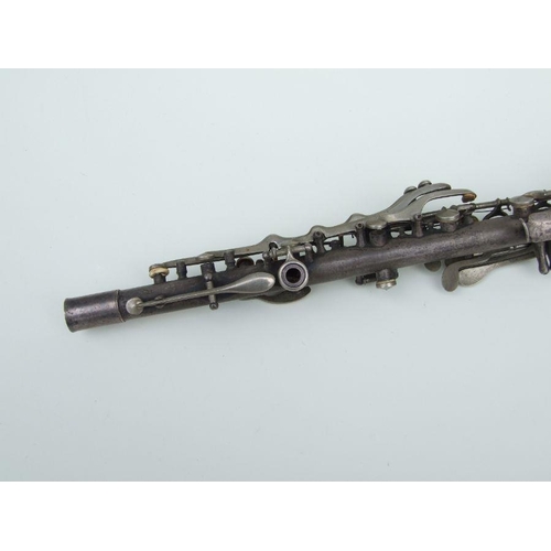 170 - An early 20th century Cleveland Musical Instrument Co. silver plated clarinet, 55cms long (missing m... 