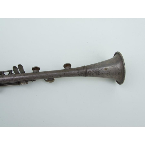 170 - An early 20th century Cleveland Musical Instrument Co. silver plated clarinet, 55cms long (missing m... 