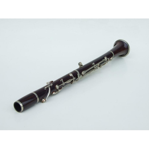 171 - A late 19th / early 20th century rosewood clarinet, retailed by 'SA Chappell, 52 New Bond Street' an... 