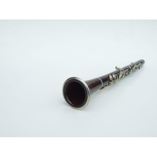 171 - A late 19th / early 20th century rosewood clarinet, retailed by 'SA Chappell, 52 New Bond Street' an... 