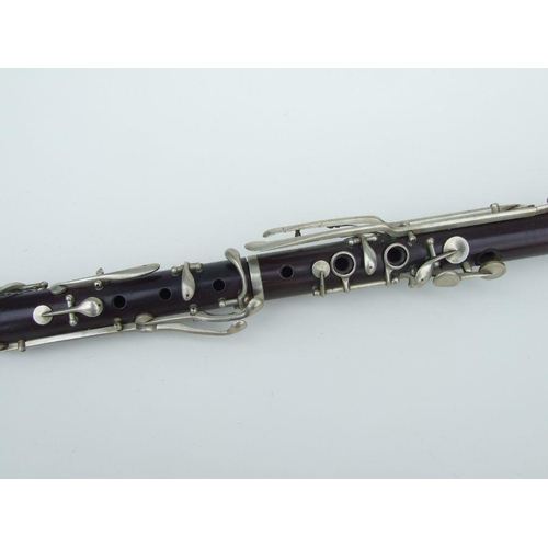 172 - A F Besson of London rosewood clarinet, 57cms long (missing mouthpiece).