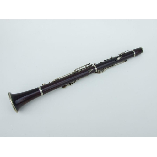 172 - A F Besson of London rosewood clarinet, 57cms long (missing mouthpiece).