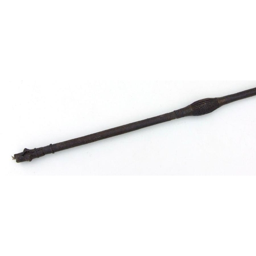 207 - An African tribal spear with leaf head and carved wooden shaft, 154cms long.