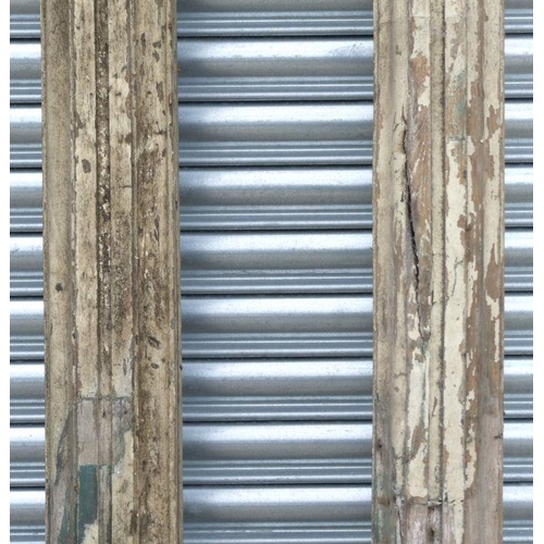 21 - A pair of impressive distressed painted architectural oak columns, 299cms long (2).